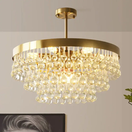 Elegant Round Water Drop Golden Chandelier - A Postmodern Light Luxury Fixture for Living Rooms, Bedrooms, and Dining Spaces - DecorGlobe